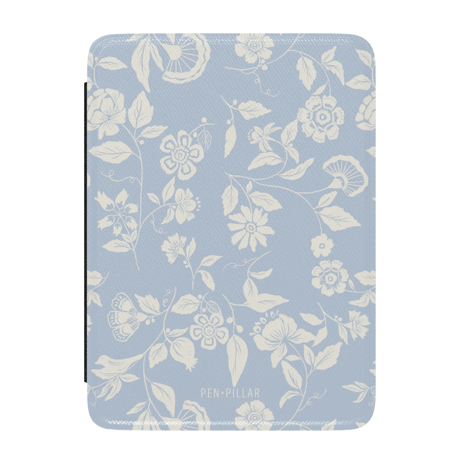 Spritz Kindle case featuring a light blue floral design with white flowers and leaves, labeled "PEN-PILLAR" at the bottom.
