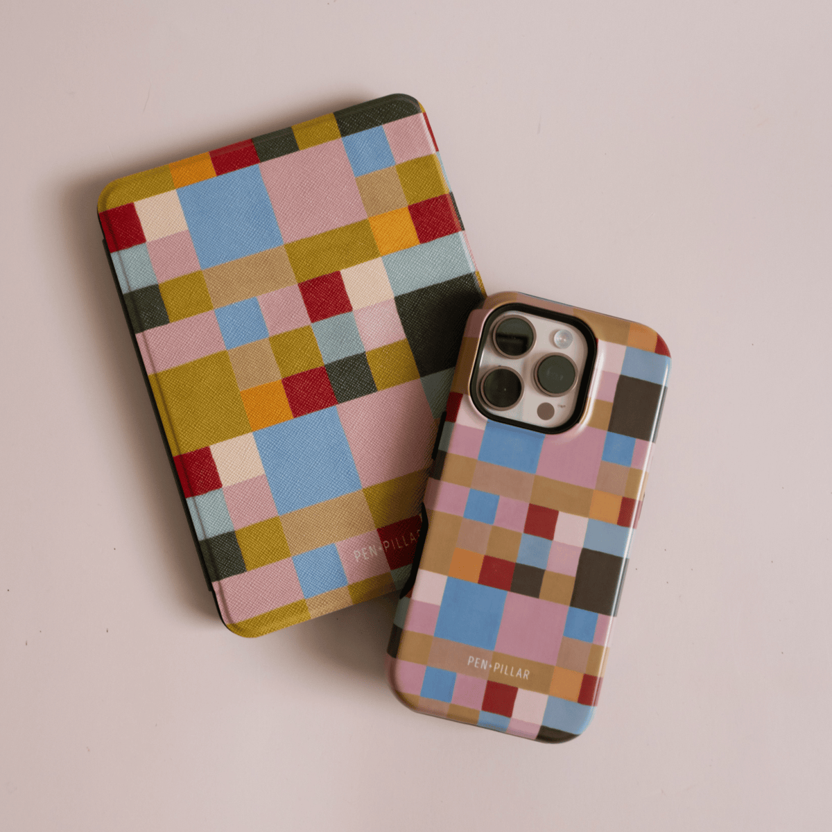 Colorblock Kindle case and iPhone case, painterly squares in mustard, pink, blue and green, on a blush background
