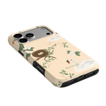 Swan Hollow iPhone case featuring a pastel background, swan illustrations, and a nest design with foliage accents.