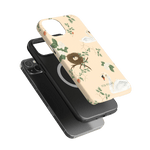 Swan Hollow iPhone case featuring a pastel background with swans, a nest, and floral designs.