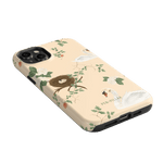 Swan Hollow iPhone case featuring a light beige background with swan and floral designs.