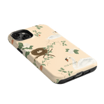 Swan Hollow iPhone case featuring a floral design with swans and a nest on a peach background.