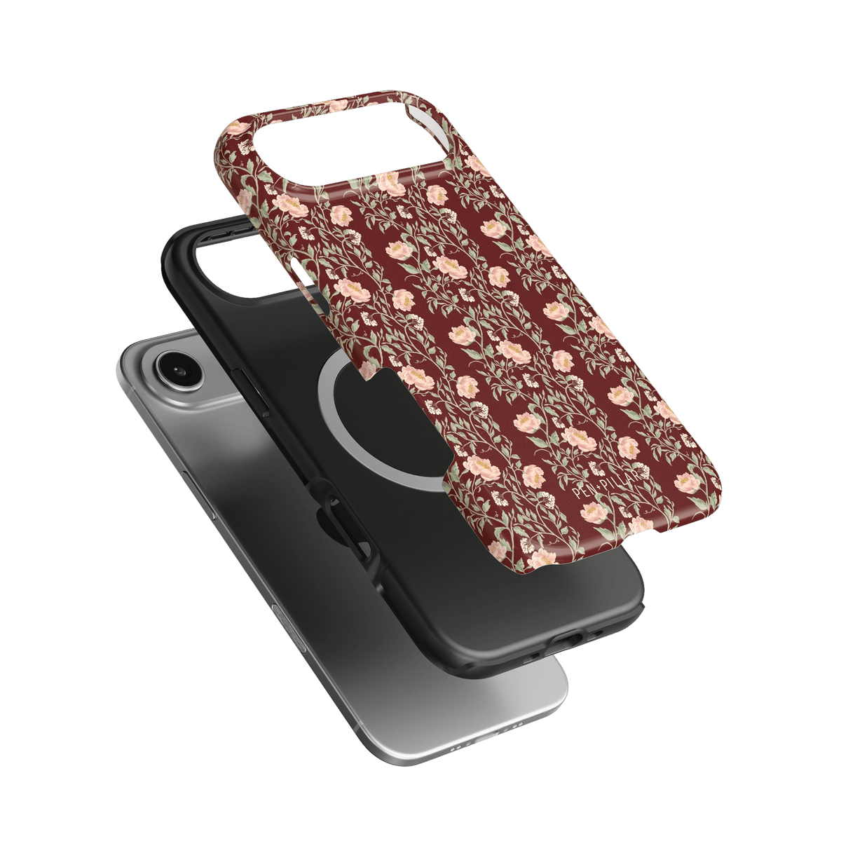 Thicket iPhone case featuring a floral pattern in burgundy and cream, layered over a black phone case.