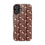 Thicket iPhone case featuring a floral pattern on a dark red background with a glossy finish.