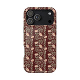 Thicket iPhone case featuring a floral pattern with pink flowers on a dark burgundy background.