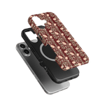Thicket iPhone case featuring a floral pattern in burgundy and cream, layered over a black protective case.