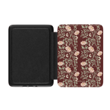Thicket Kindle case with floral design in pink and green on a maroon background, featuring a black interior.