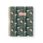 Thicket Notebook with a floral design featuring pink flowers on a dark green background and a gold spiral binding.