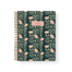 Thicket Notebook with a floral design featuring pink flowers on a dark green background and a gold spiral binding.