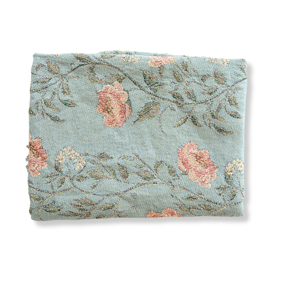 Thicket woven blanket in soft blue with floral patterns in pink and green, neatly folded.