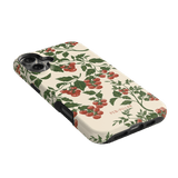 Tomato vines iPhone case featuring a floral design with red tomatoes on a cream background.