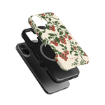 Tomato vines iPhone case featuring a floral design with red tomatoes on a cream background, shown from multiple angles.