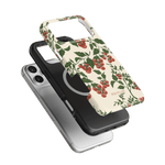 Tomato vines iPhone case featuring a floral design with red tomatoes on a cream background, shown from multiple angles.