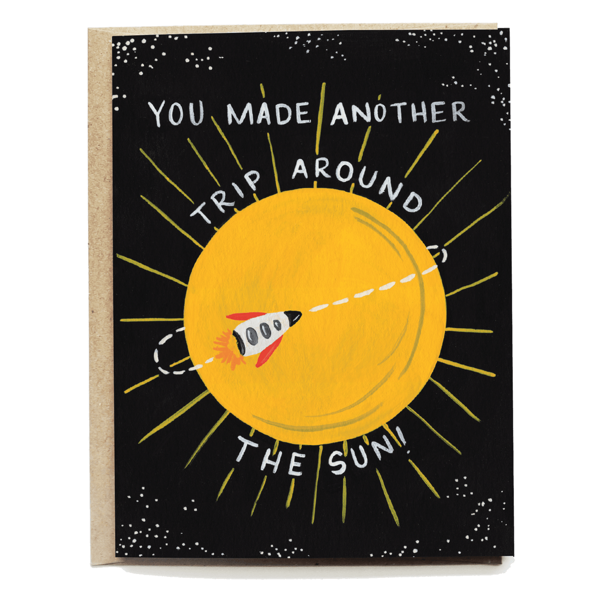 Birthday card featuring a yellow sun and a rocket, with text saying "You made another trip around the sun!" on a black bac...