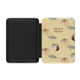 Umbrellas Kindle case featuring a yellow background with colorful beach umbrellas and the text "Beach Reads.