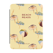 Umbrellas Kindle case featuring a yellow background with colorful beach umbrellas and the text "Beach Reads.