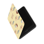 Umbrellas Kindle case with a yellow background and colorful umbrella illustrations, partially open to show the device inside.