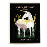Unicorn birthday card featuring a white unicorn with a rainbow mane on a black background, with "Happy birthday to a magic...
