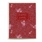 Vine+Bloom birthday card featuring a red floral design with the text "happy birthday" in a decorative frame.