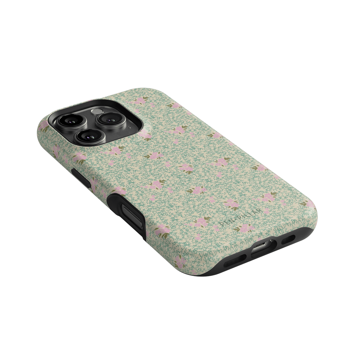 Vine+Bloom iPhone case featuring a floral pattern with pink flowers on a green background, angled view.