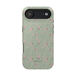 Vine+Bloom iPhone case featuring a floral pattern in pink and green on a textured background.