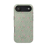 Vine+Bloom iPhone case featuring a floral pattern in pink and green on a textured background.