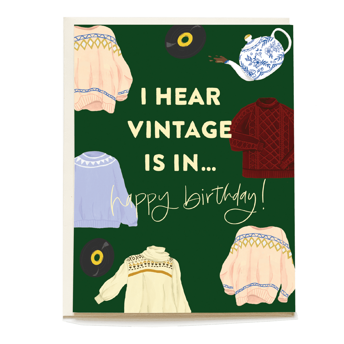 Vintage birthday card featuring colorful sweaters and a teapot on a green background with the text "I hear vintage is in.....