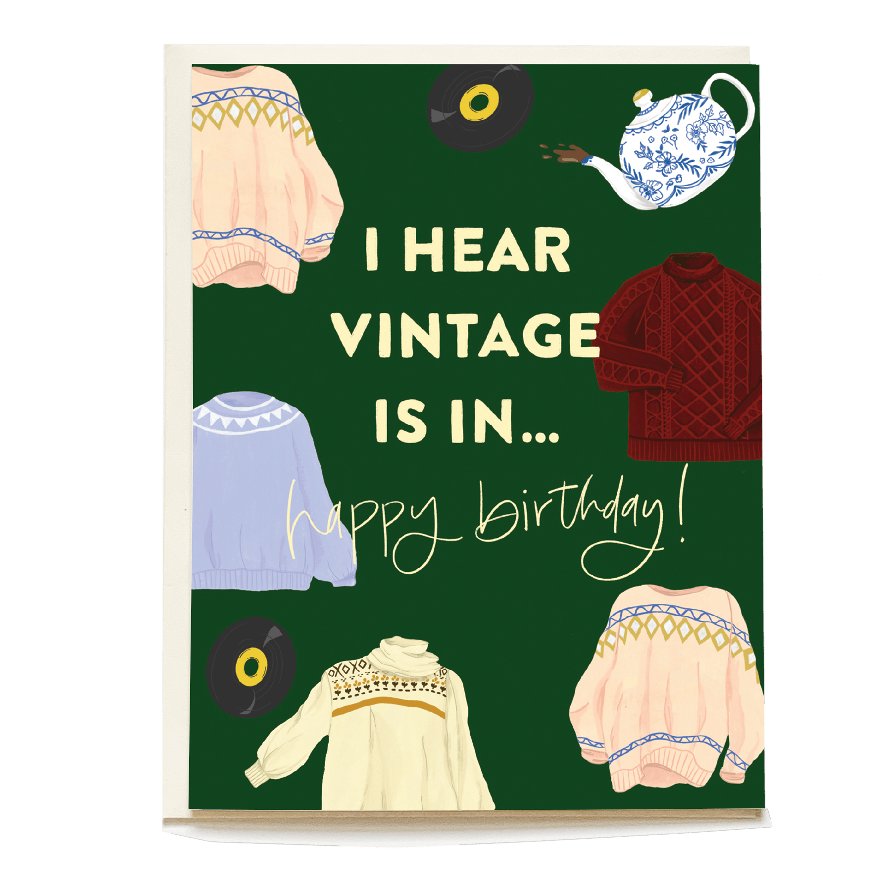 Vintage birthday card featuring colorful sweaters and a teapot on a green background with the text "I hear vintage is in.....