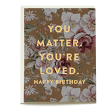 Vintage floral birthday card featuring a brown background with pink and white flowers and gold text saying "You matter, yo...