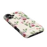 Viola iPhone case featuring a floral design with pink and purple flowers on a cream background.