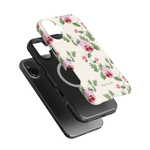 Viola iPhone case featuring a floral design with pink and purple flowers on a white background, layered over a black case.