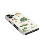 Willow iPhone case featuring a nature-themed design with animals and landscapes in green and beige tones.