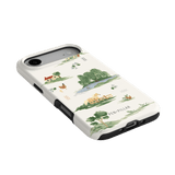 Willow iPhone case featuring a nature-inspired design with trees, animals, and a scenic landscape in soft colors.