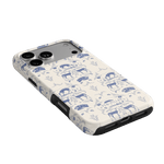 Woodland iPhone case featuring a blue and white animal print design with elephants and floral elements.