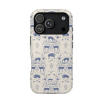Woodland iPhone case featuring a blue and cream design with deer and floral patterns on a protective shell.