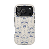 Woodland iPhone case featuring a blue and cream design with deer and floral patterns on a protective shell.