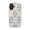 Woodland iPhone case featuring a blue and cream pattern with deer and floral designs on a sleek surface.