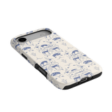 Woodland iPhone case featuring a blue and white animal pattern on a slim, protective design.