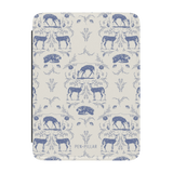 Woodland Kindle case featuring a blue and white deer and floral pattern on a textured background.