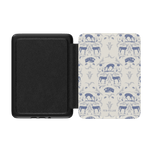 Woodland Kindle case with a blue deer and floral pattern on a cream background, open to show the interior.