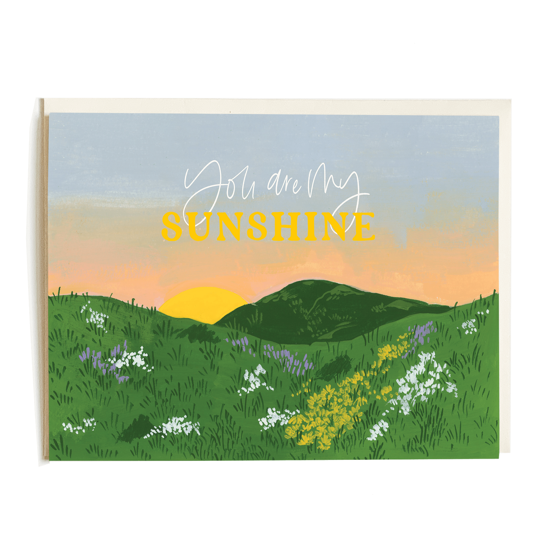 You Are My Sunshine card featuring a sunset over green hills with white and purple flowers.
